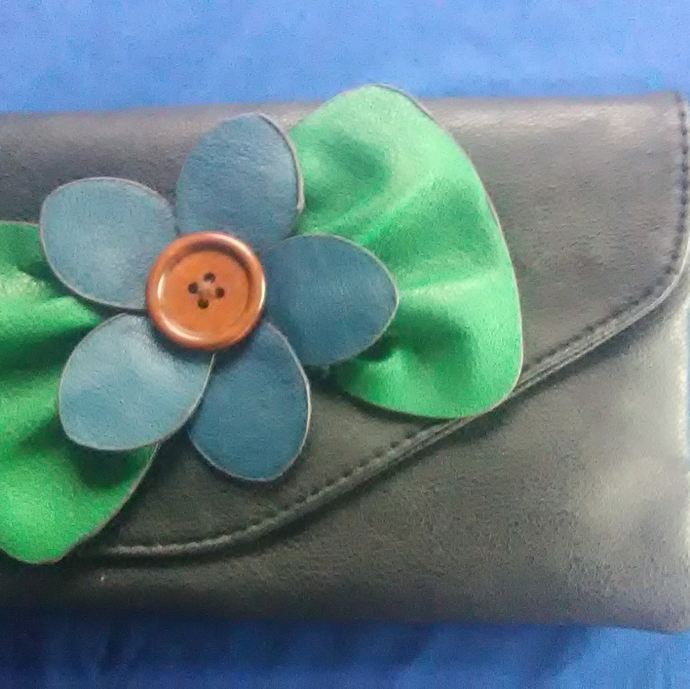 SAX black faux leather purse  with flower appliqué